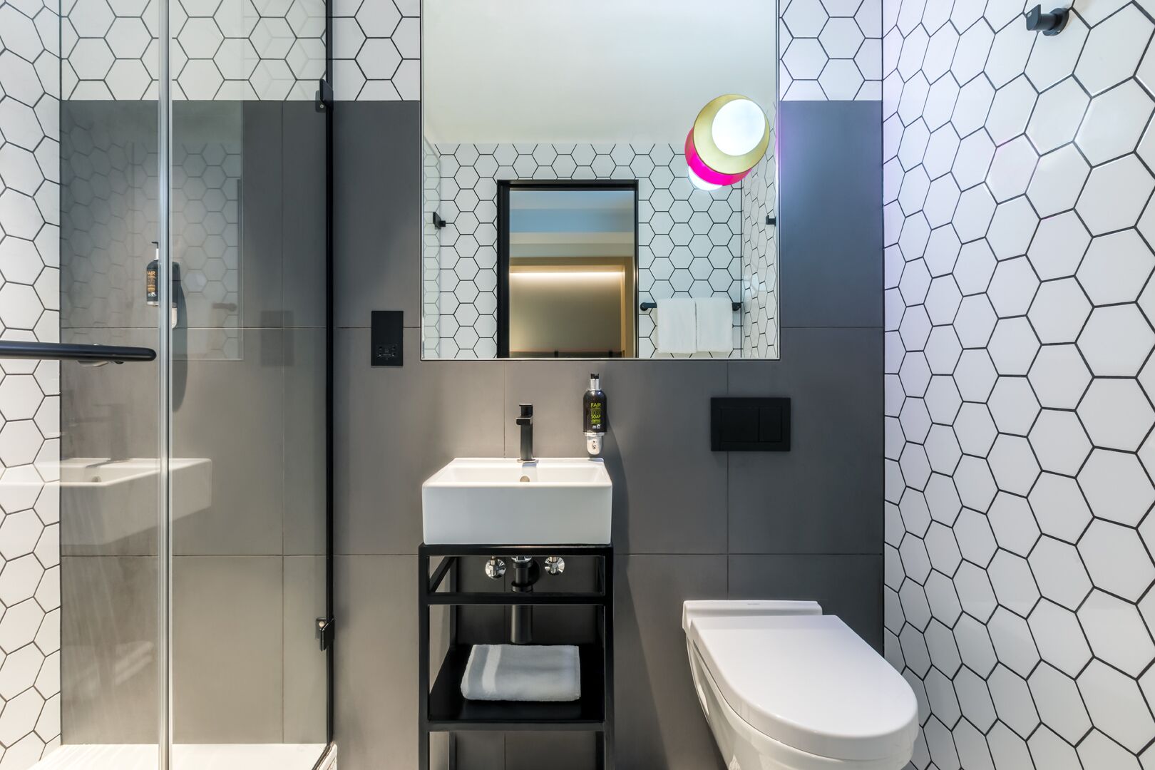 cozy comfort with a little extra space | bathroom | shower, free toiletries, hair dryer, towels