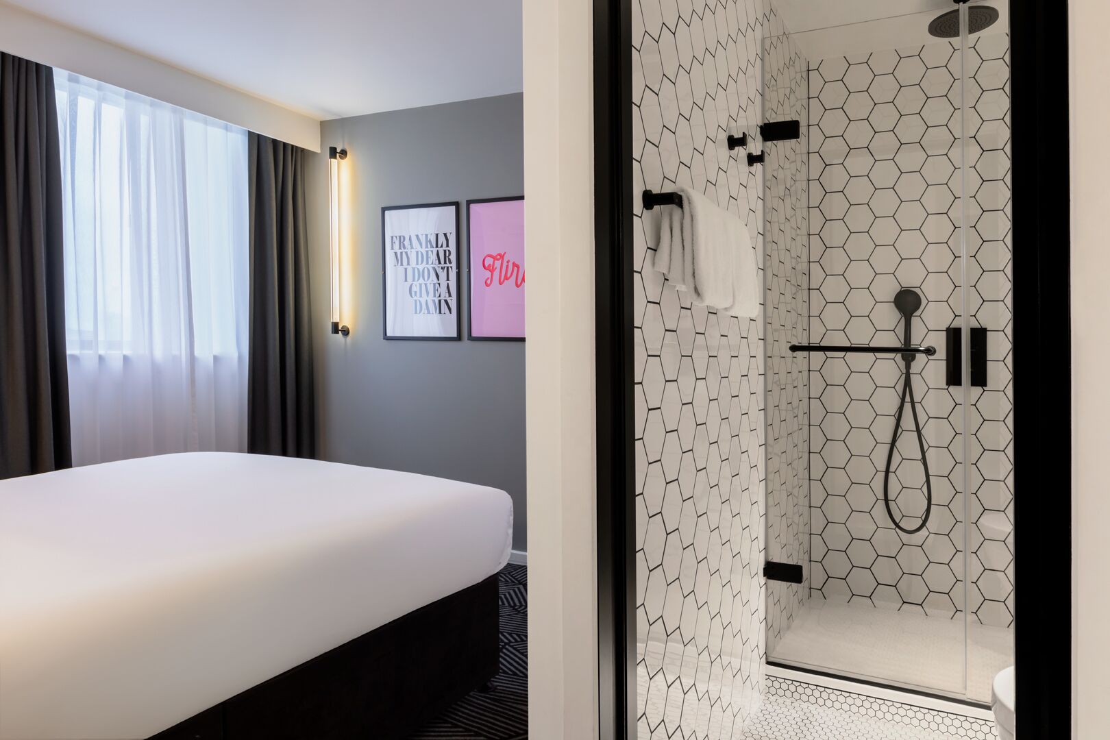 cozy comfort with a little extra space | bathroom | shower, free toiletries, hair dryer, towels