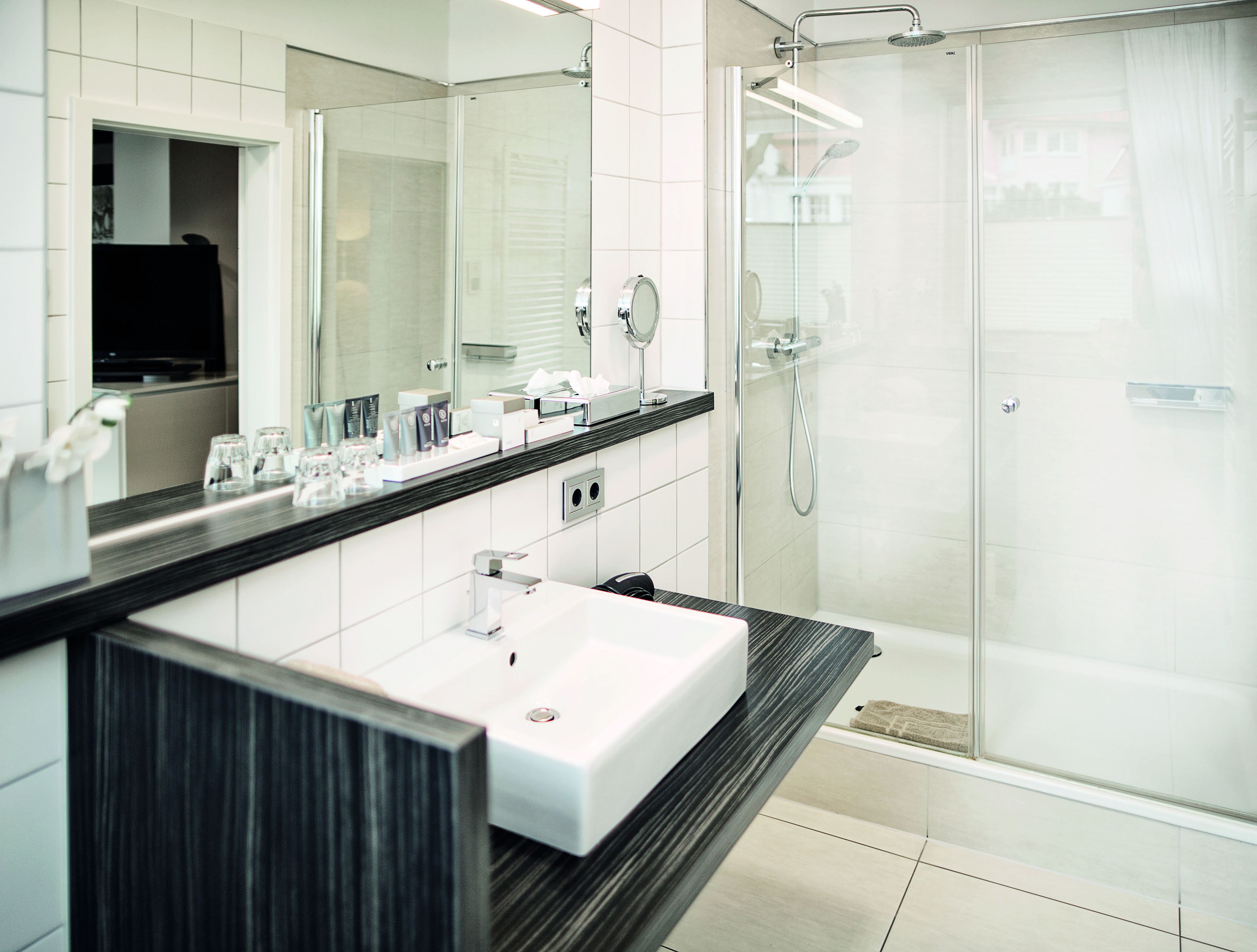 free toiletries, hair dryer, slippers, towels