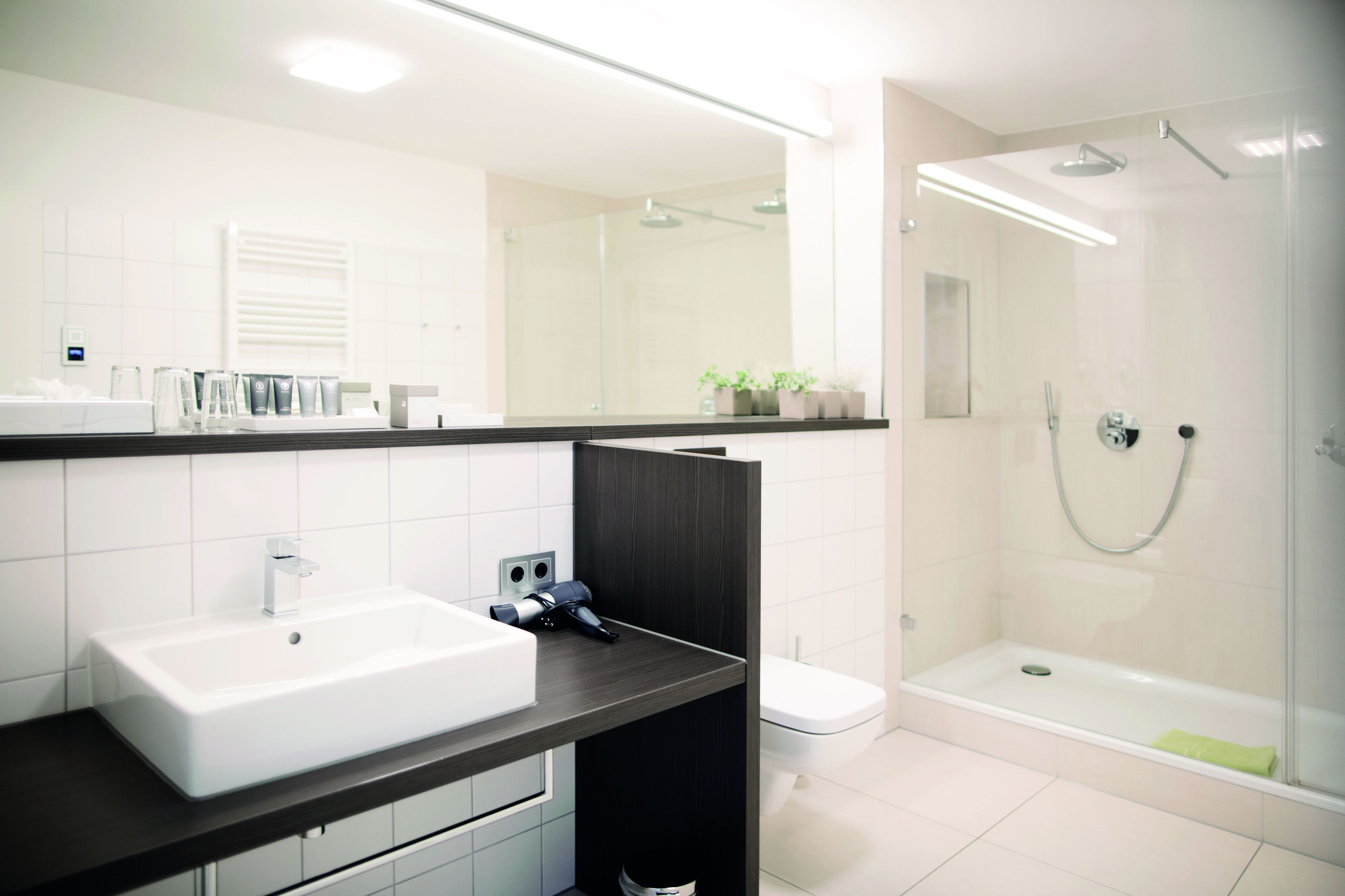 free toiletries, hair dryer, slippers, towels