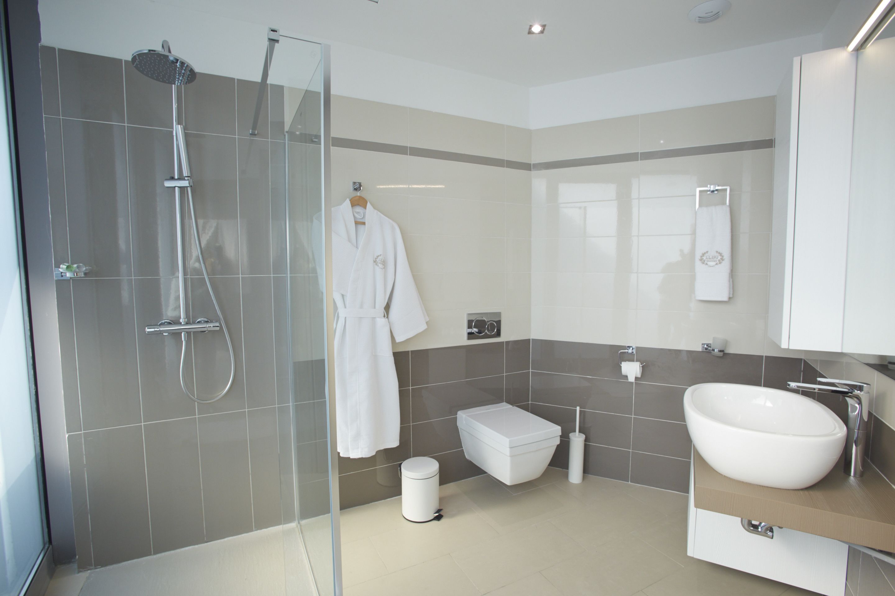 shower, free toiletries, bathrobes, slippers