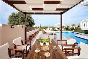 Outdoor pool, pool umbrellas, pool loungers
