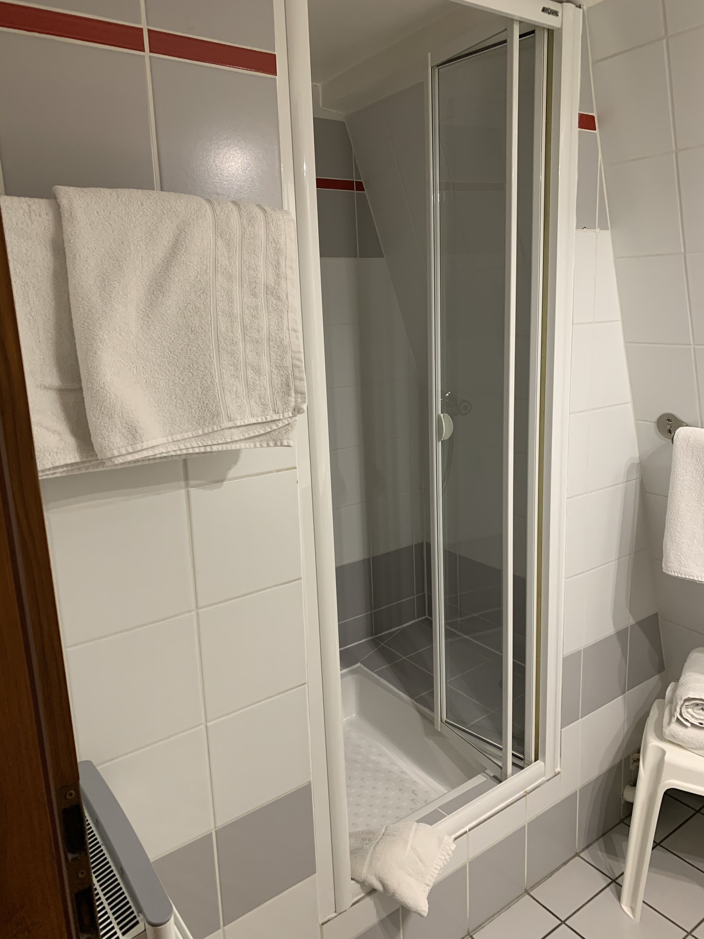 family room | bathroom | shower, hair dryer, towels