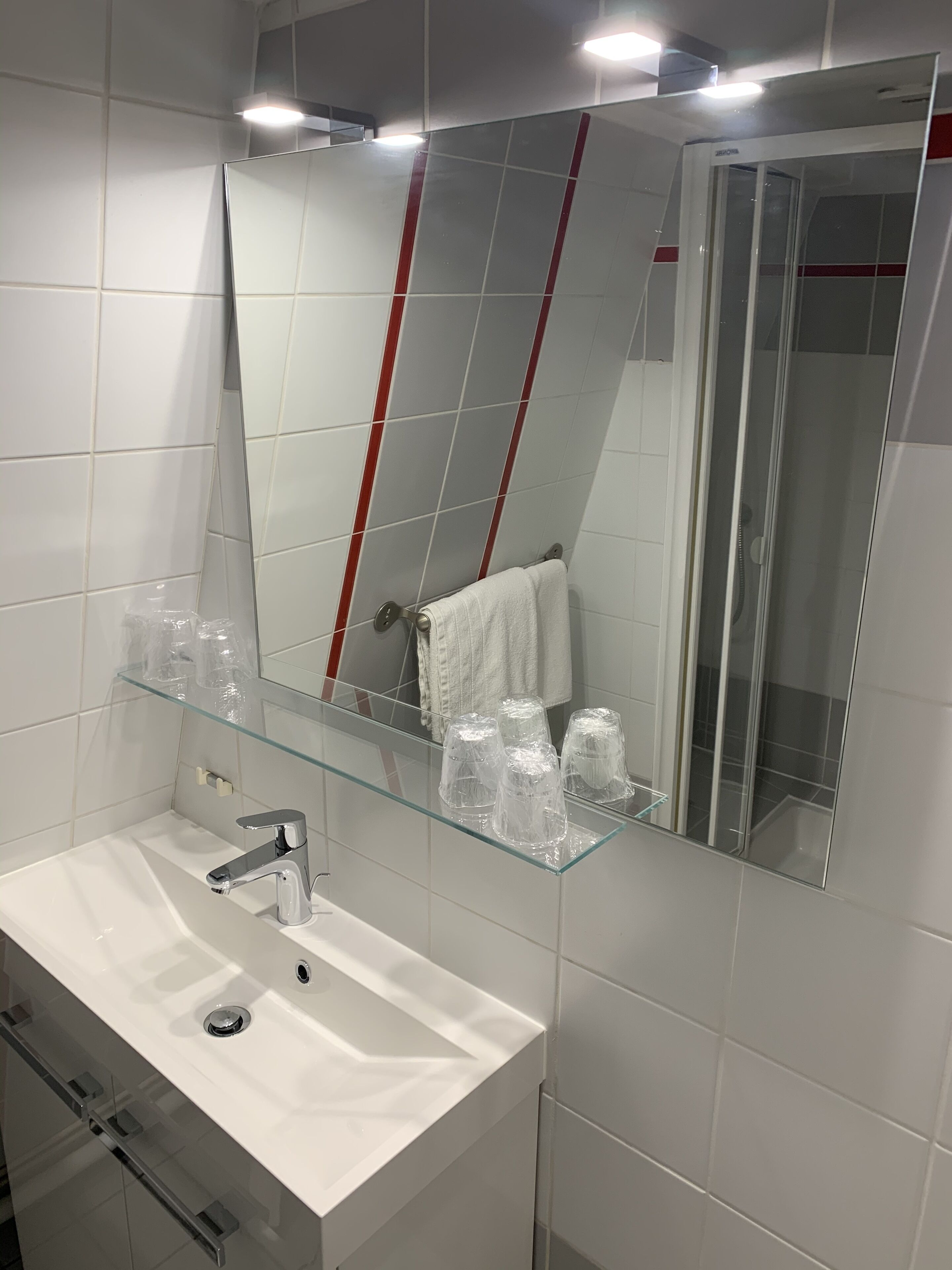 family room | bathroom | shower, hair dryer, towels