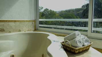Junior Room, Pool View | Private spa tub