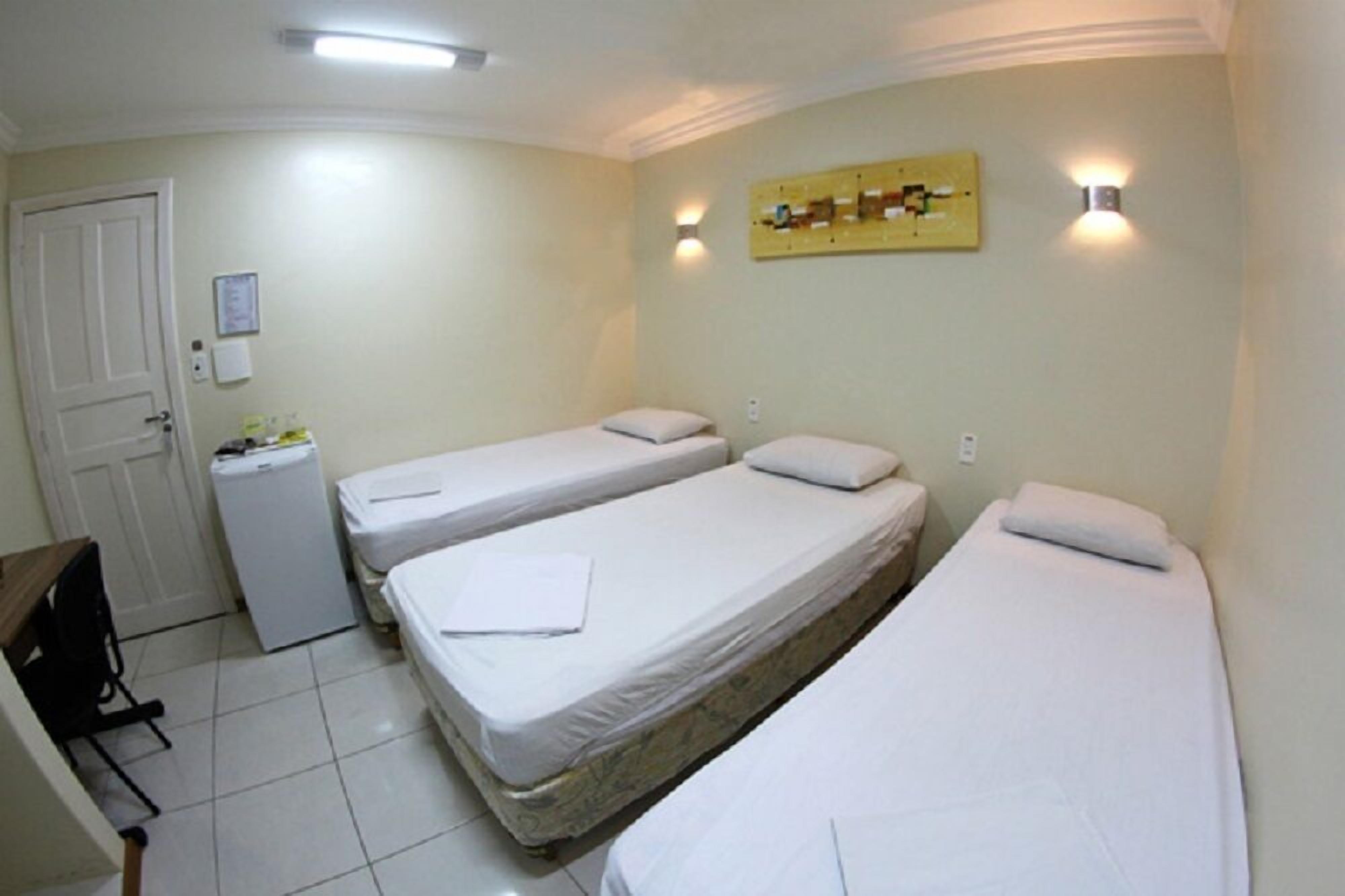 triple room | minibar, in-room safe, desk, blackout curtains