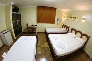 Quadruple Room | Minibar, in-room safe, desk, blackout drapes - Hotel Belem (Fortaleza)
