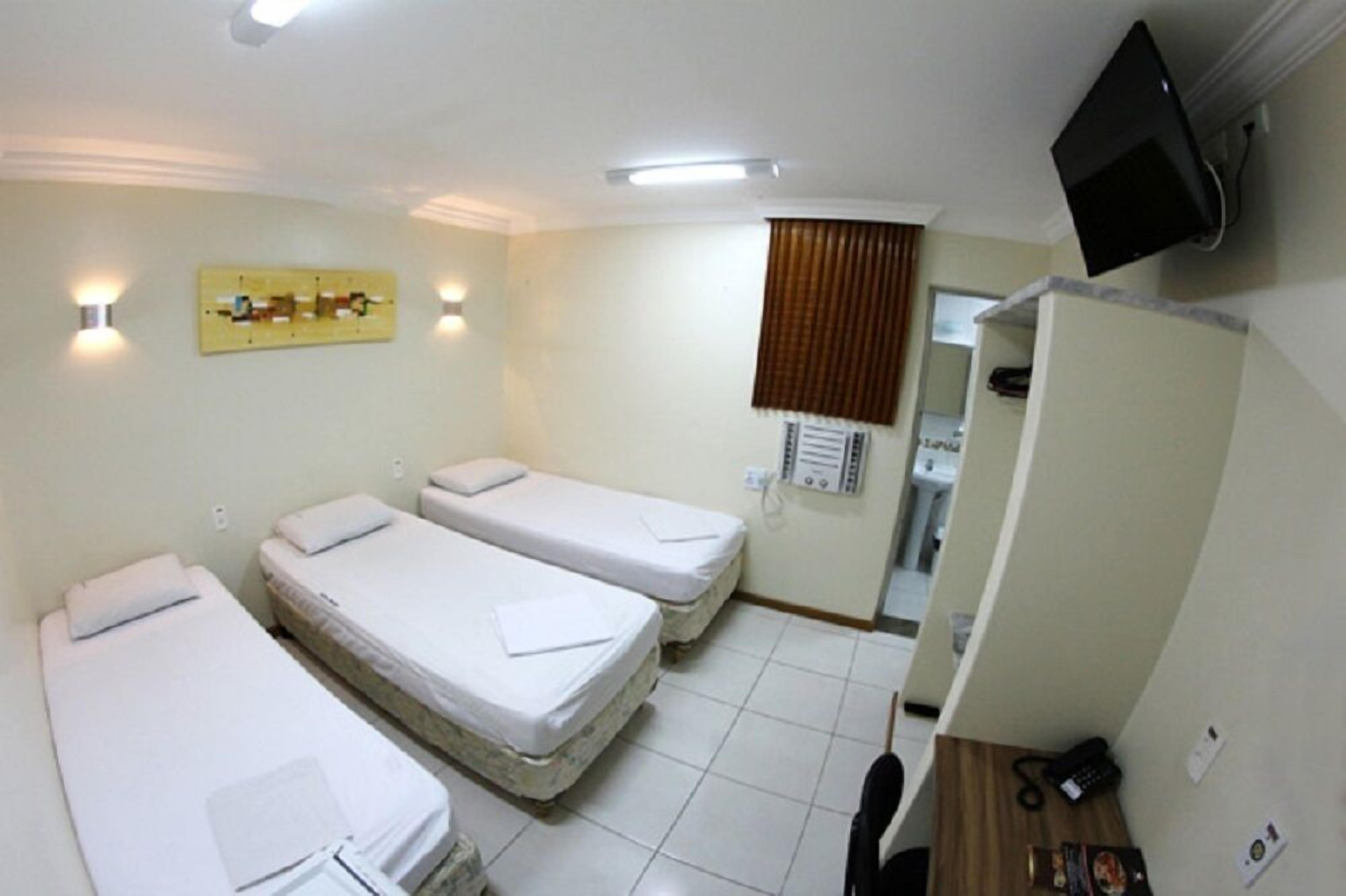 triple room | minibar, in-room safe, desk, blackout curtains