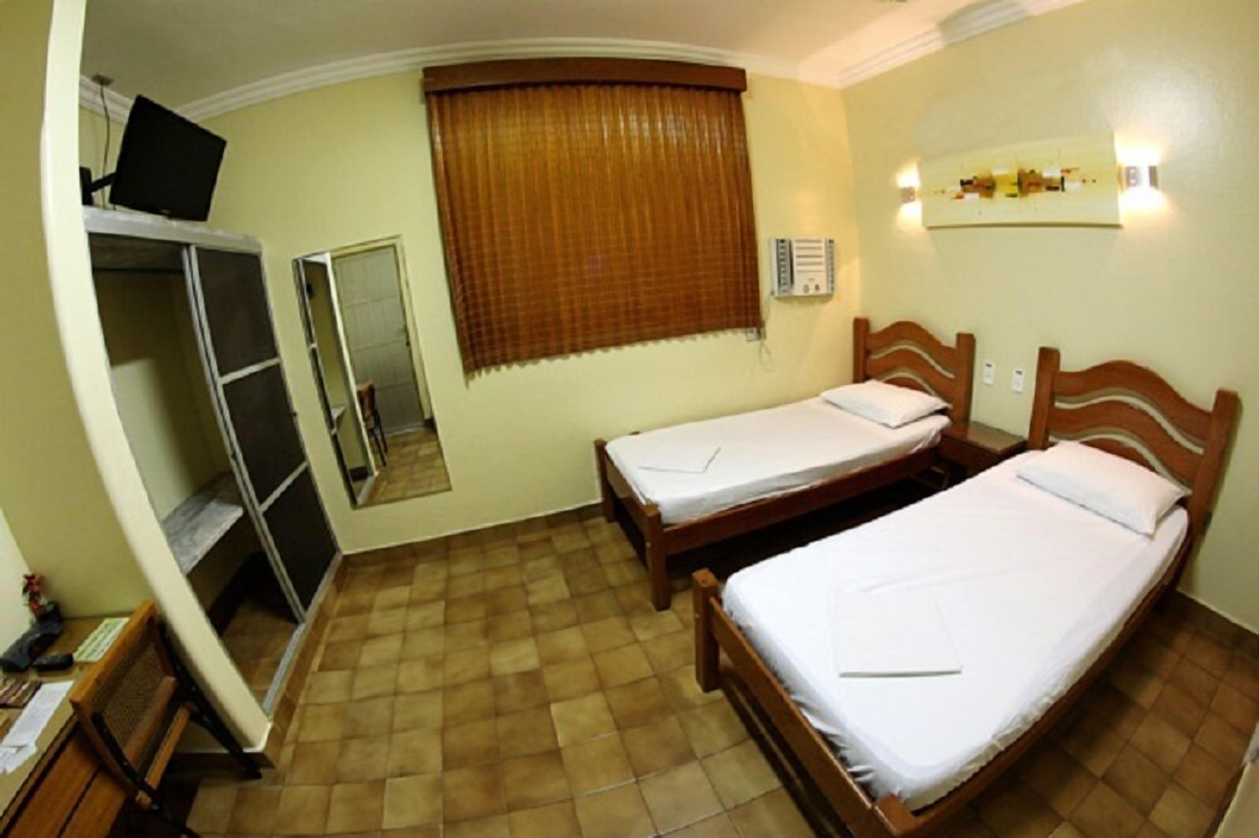 single room | minibar, in-room safe, desk, blackout curtains