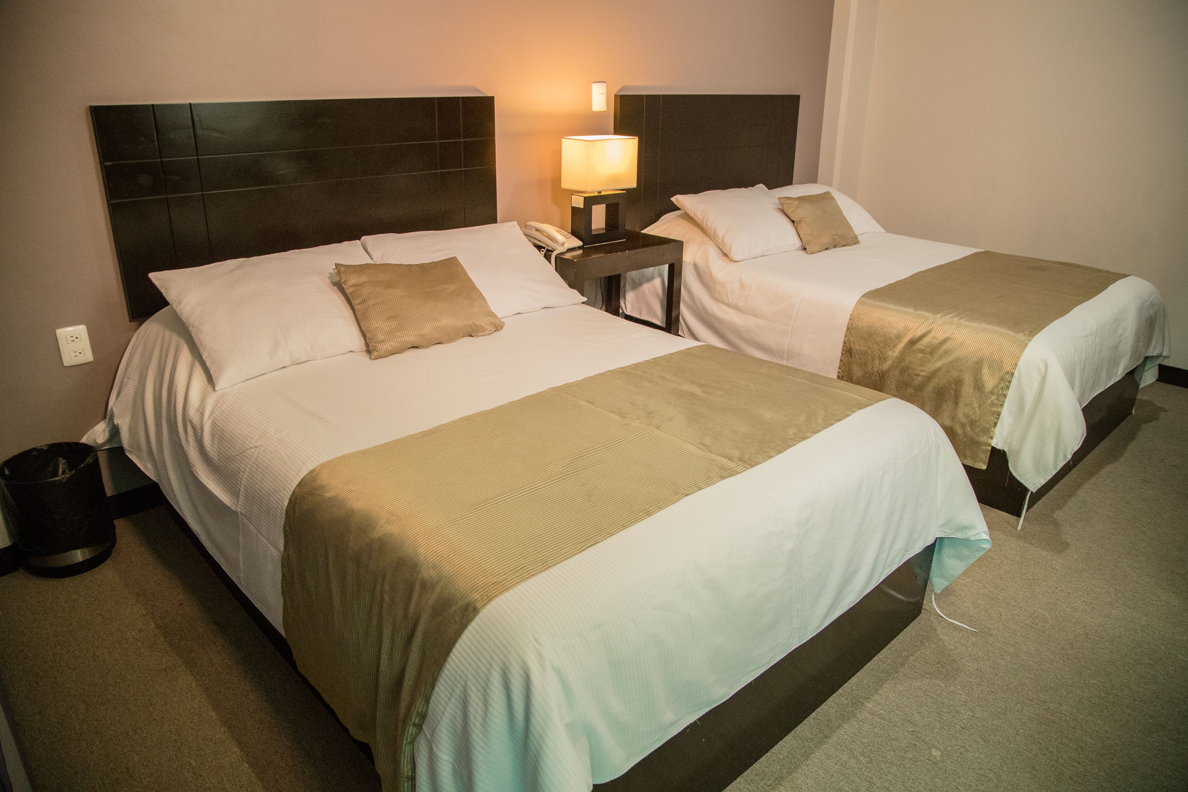 family double room, 2 double beds | in-room safe, desk, iron/ironing board, free wifi