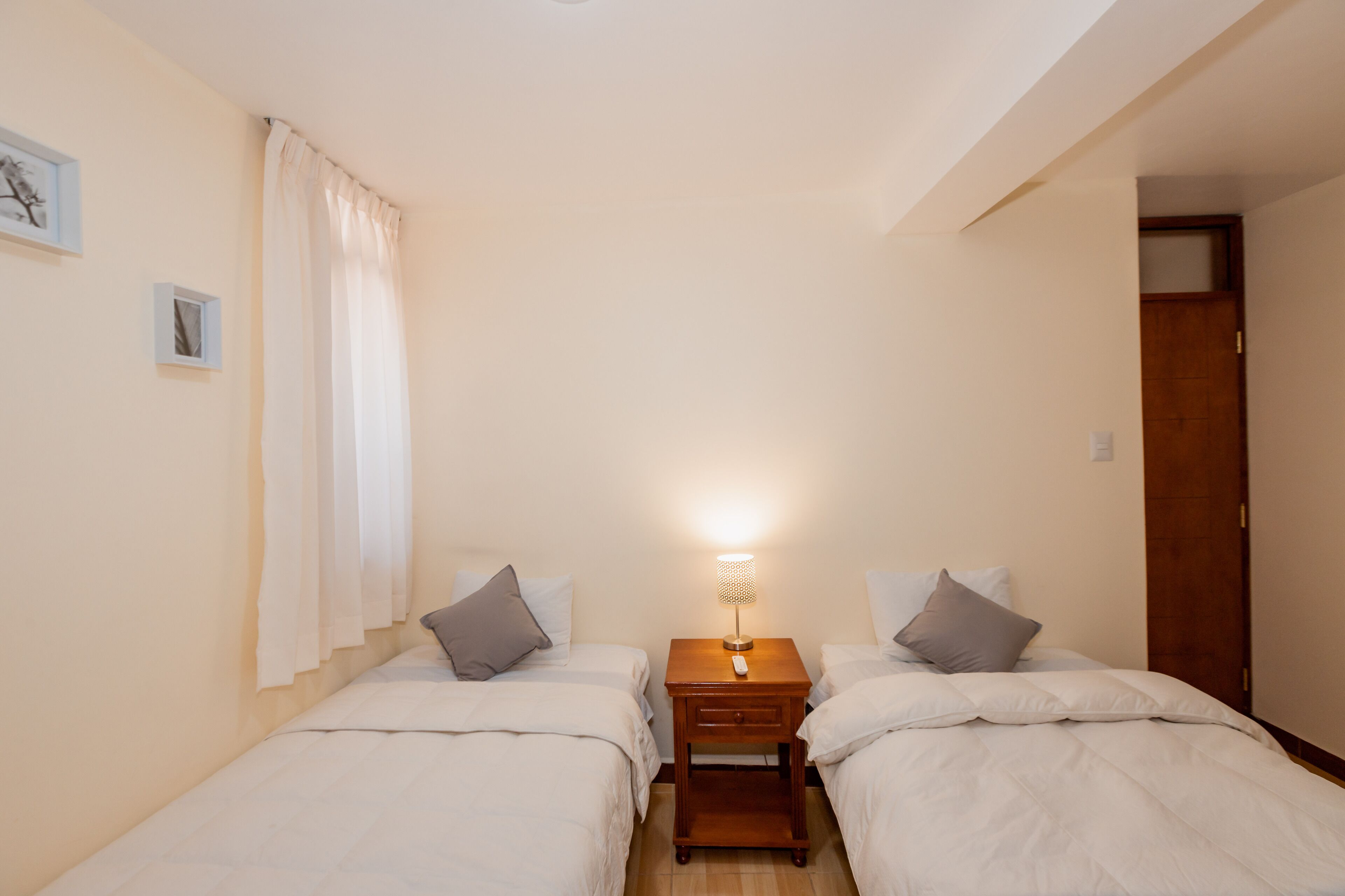 standard twin room, 1 bedroom, courtyard view | down duvets, individually decorated, individually furnished, desk