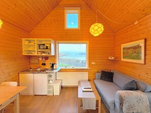 Cottage | Living room | Flat-screen TV - Mjóeyri Travel holiday homes (Fjardabyggd)