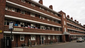 A multi-story residential building with a sign indicating it is a house for residents only. - Beechwood House (London)