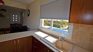Villa | Private kitchen | Coffee/tea maker, full-sized fridge, microwave, oven - Villa Favor (Ayia Napa)