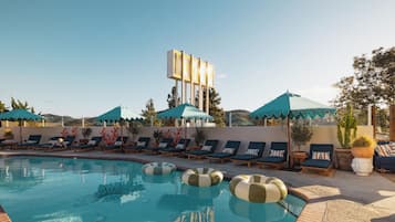 Outdoor pool, open 9:00 AM to 9:00 PM, pool umbrellas, sun loungers