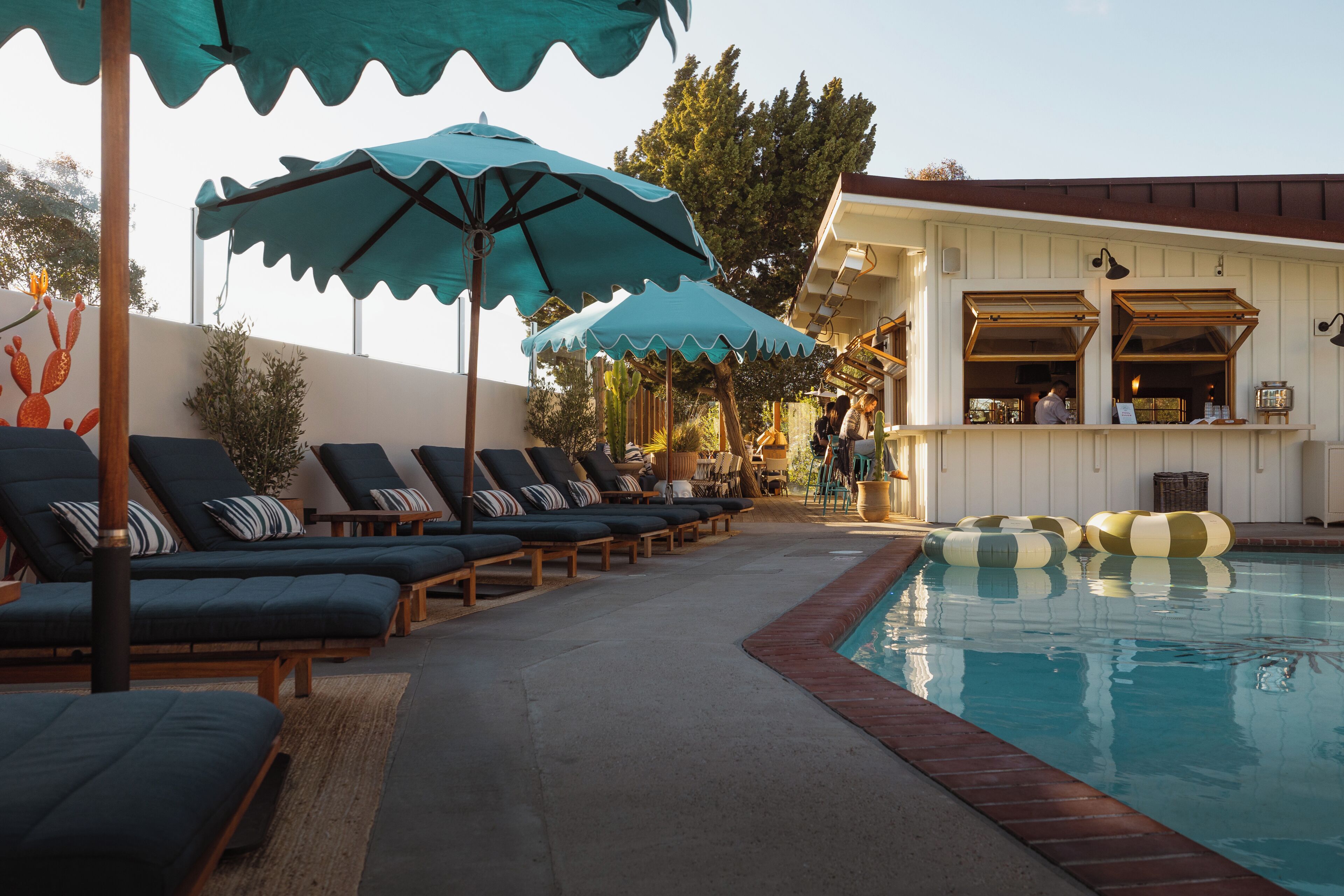 Outdoor pool, open 9:00 AM to 9:00 PM, pool umbrellas, sun loungers