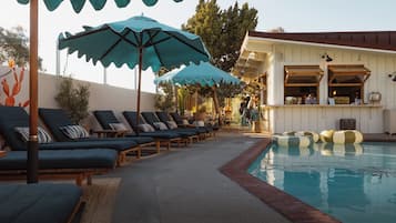 Outdoor pool, open 9:00 AM to 9:00 PM, pool umbrellas, sun loungers
