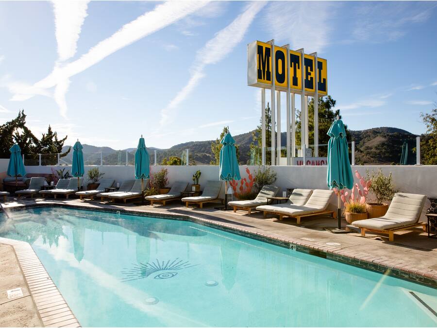 Outdoor pool, open 9:00 AM to 9:00 PM, pool umbrellas, sun loungers