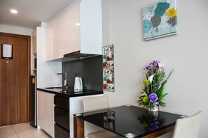 Studio with Pool View | Private kitchenette | Fridge, microwave, stovetop, electric kettle - Water Park Condominium by Able Estate (Pattaya)