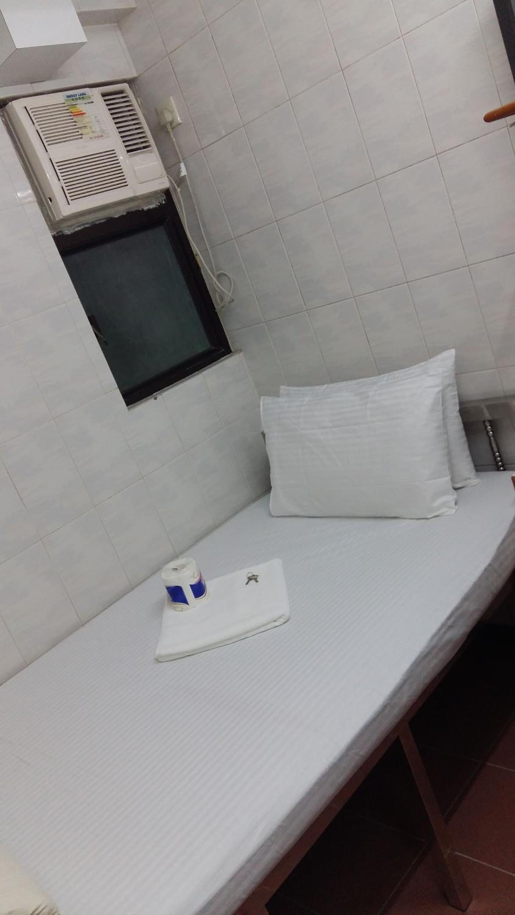 Foto - New Yan Yan Guest House reception 9th floor Flat E4 E6