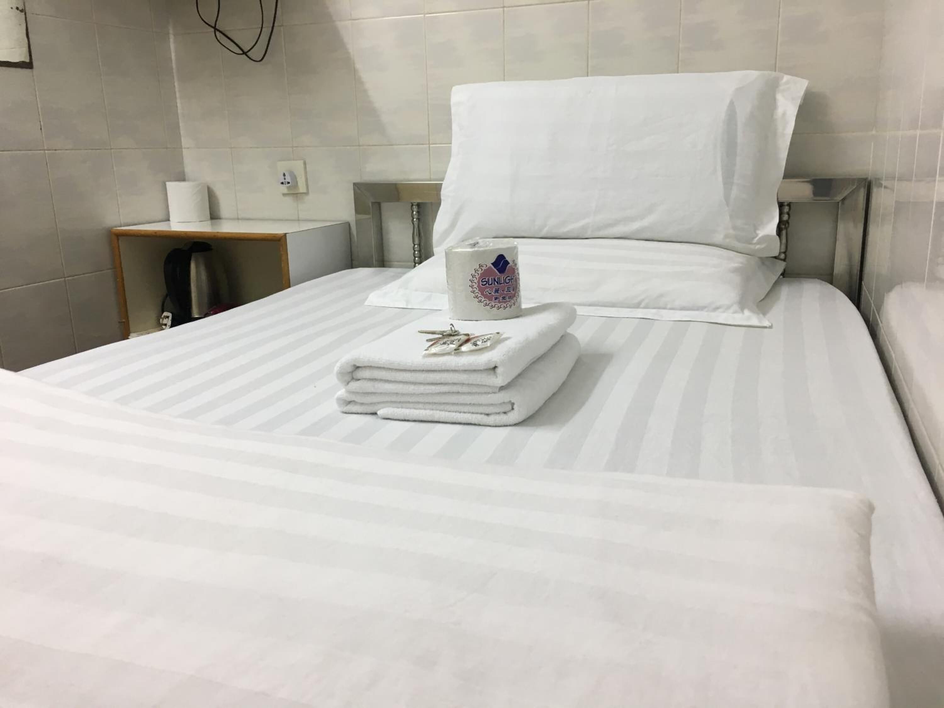 Foto - New Yan Yan Guest House reception 9th floor Flat E4 E6