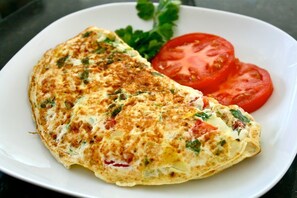 Frühstück (6.00 USD pro Person)