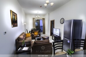 Apartment, 1 Bedroom, Pool View | 1 bedroom, in-room safe, desk, soundproofing - OSKENA Vacation Homes- Elite 10 Residential (Dubai)