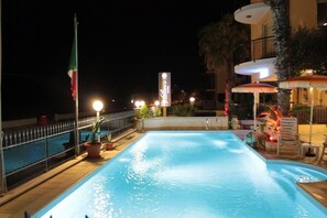 Seasonal outdoor pool, a rooftop pool, pool loungers