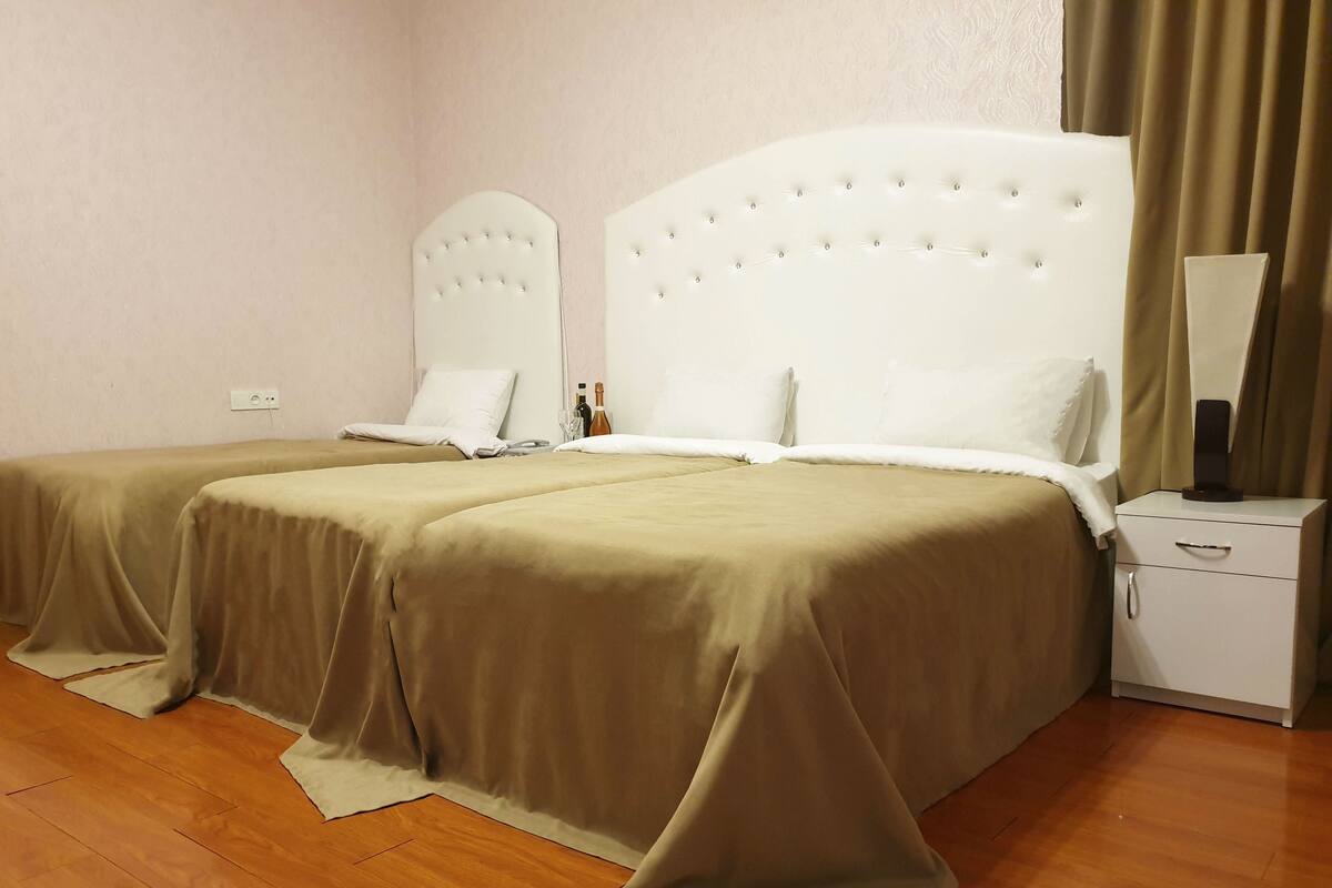 Classic Triple Room, Garden View | 1 bedroom, minibar, desk, soundproofing