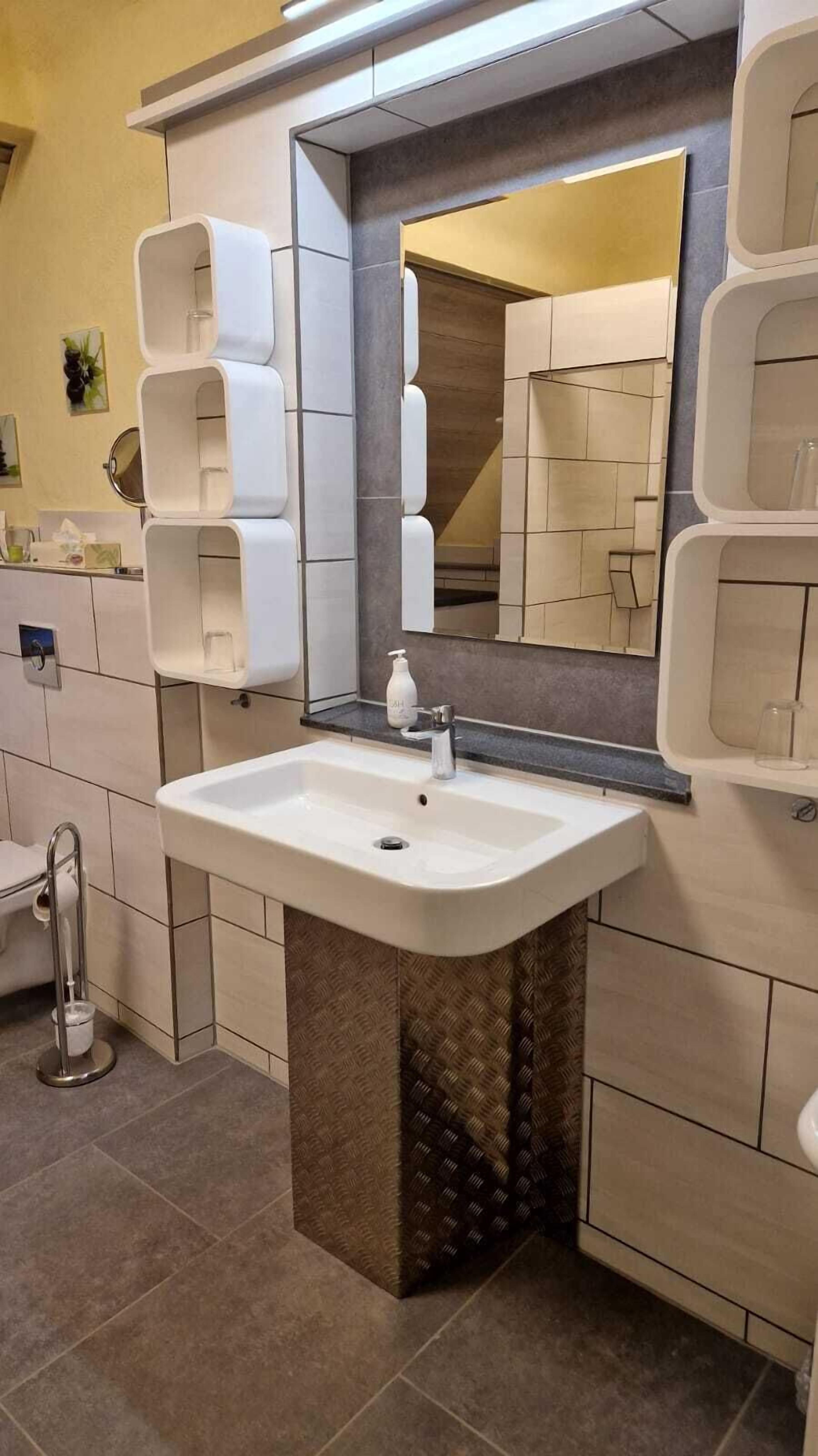 Shower, hair dryer, towels, toilet paper