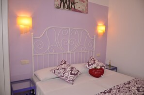 Down duvets, memory-foam beds, in-room safe, blackout curtains