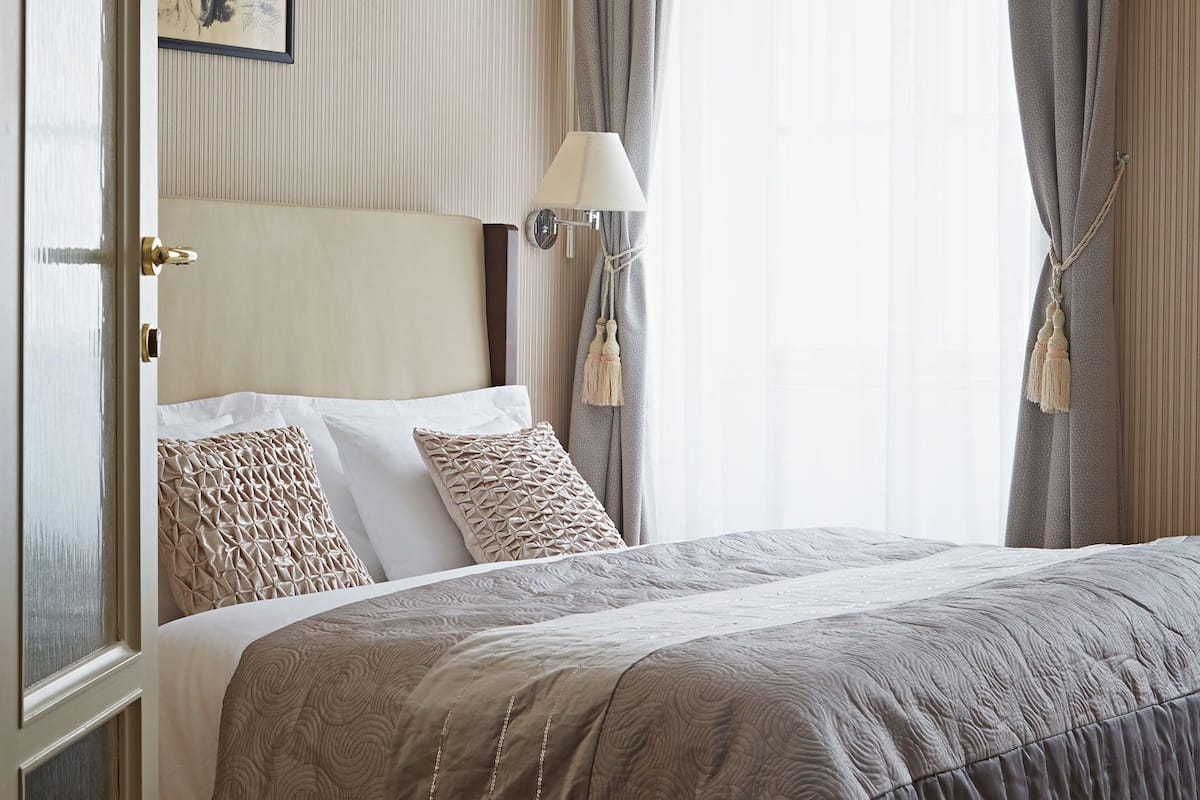 Deluxe Suite, 2 Bedrooms | Iron/ironing board, cribs (free), rollaway beds (surcharge), WiFi (free)