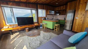 Panoramic Suite, 1 Bedroom | Living area