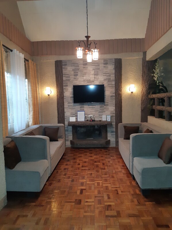 House, 3 Bedrooms | Living area | 32-inch flat-screen TV with cable channels, TV - Zya Transient house (Baguio)