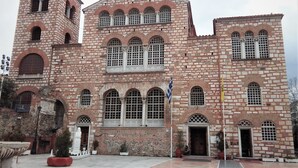 A large, historic building with multiple arched windows and a bell tower. - Tiepolo Galleria Palatina (Thessaloniki)
