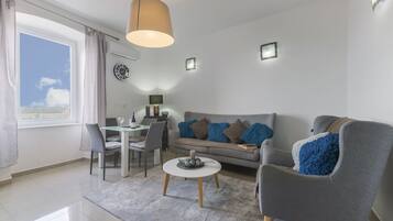 Exclusive Apartment (6) | Area soggiorno | TV a schermo piatto