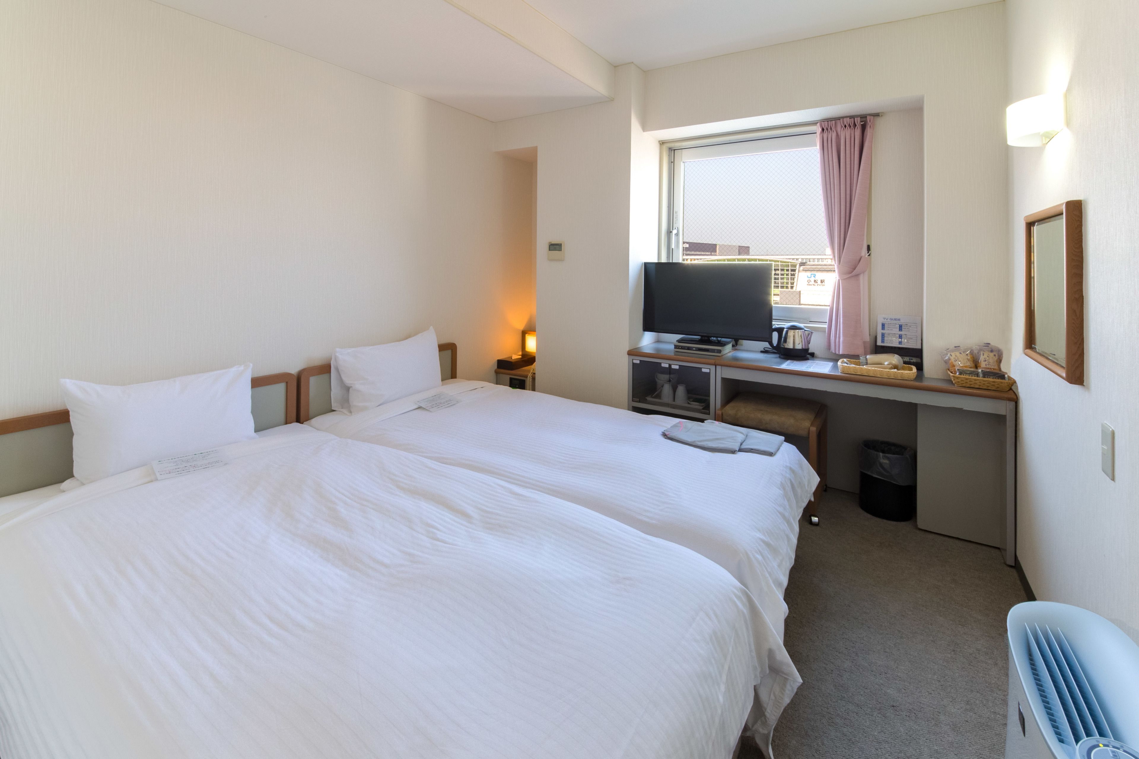 premium bedding, iron/ironing board, free wifi, bed sheets