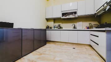 Fridge, microwave, stovetop, coffee/tea maker