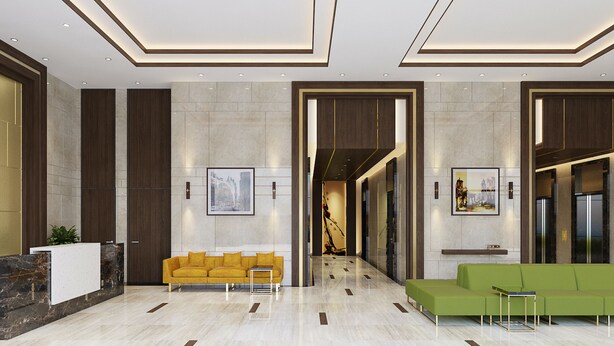 A modern lobby with a reception desk, a yellow sofa, and a green sofa. - River Gate Apartment Saigon HCMC (Ho Chi Minh City)