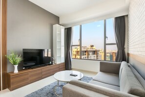Comfort Apartment, 2 Bedrooms, City View, Tower | Living room | LCD TV, Netflix