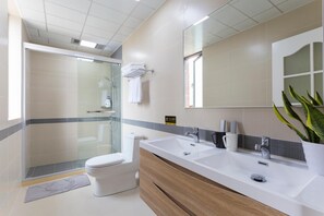 Shower, free toiletries, hair dryer, slippers