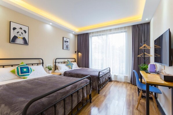 Desk, blackout curtains, soundproofing, free WiFi