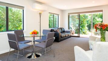 Premium-Ferienhaus, 1 Schlafzimmer, Nichtraucher, Küche (Rose) | Wohnzimmer