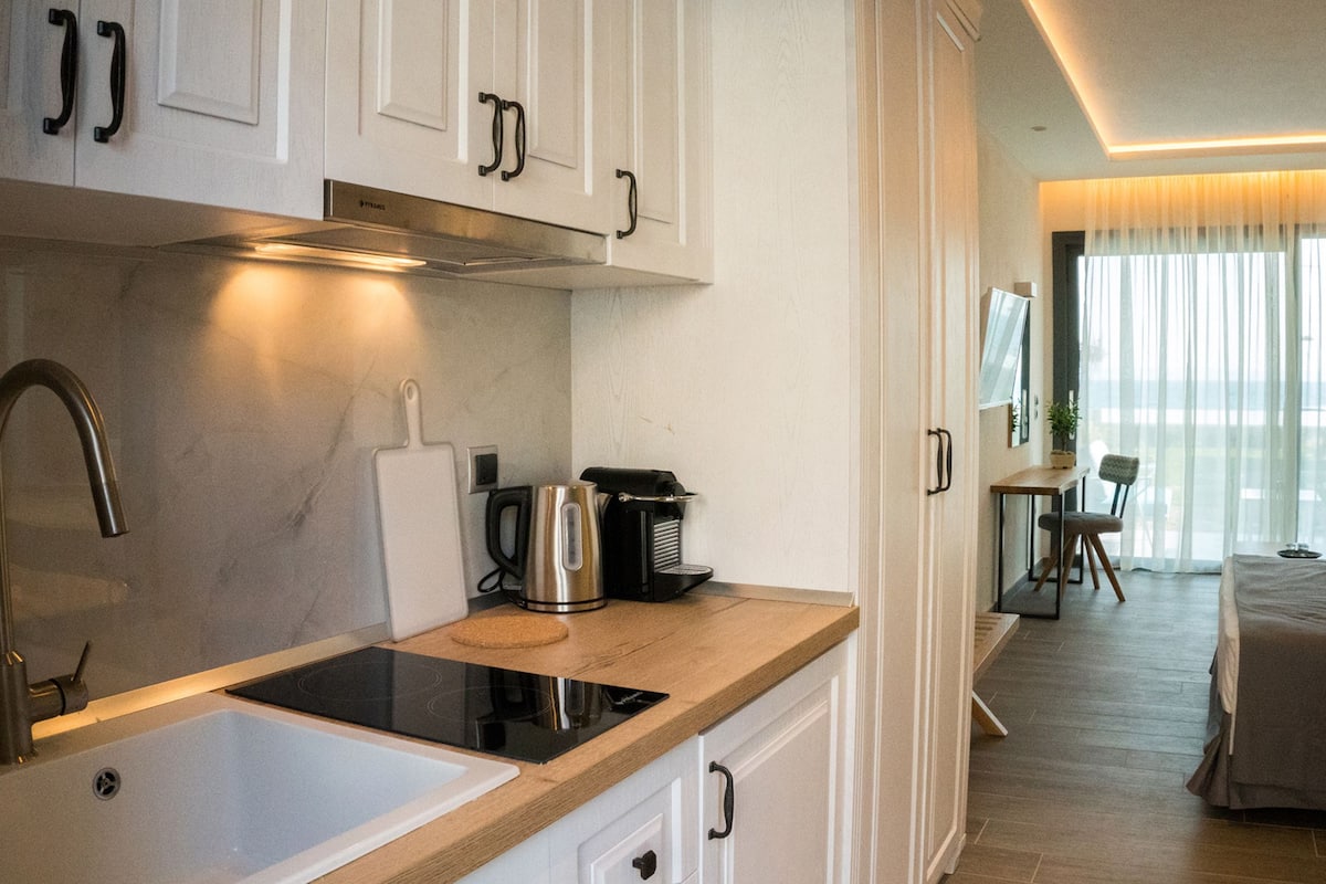 superior room, garden view | private kitchen | fridge, stovetop, espresso maker, coffee/tea maker