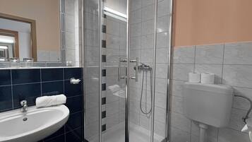 Shower, free toiletries, hair dryer, towels