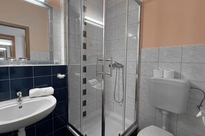 Shower, free toiletries, hair dryer, towels