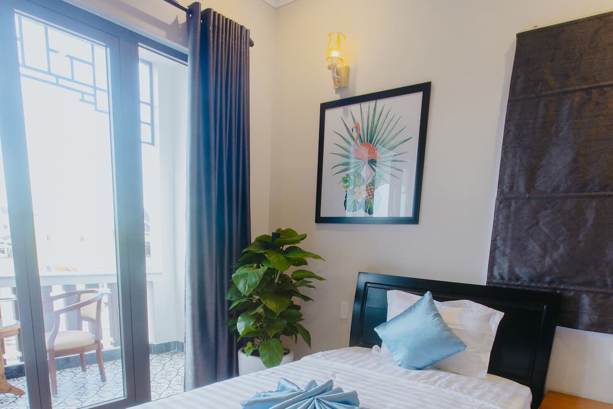 Deluxe Triple Room, Balcony, City View | Premium bedding, minibar, in-room safe, desk