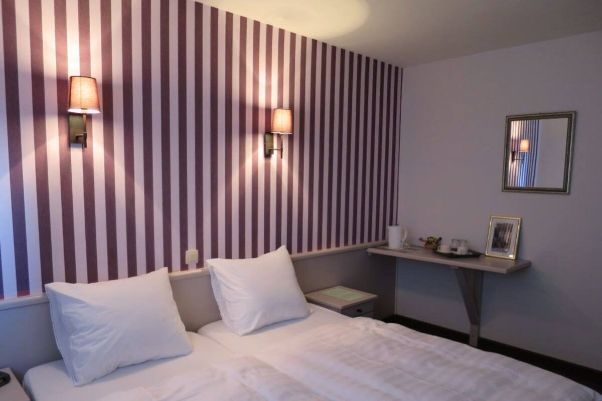 Basic Double Room Single Use, 1 Bedroom | Desk, blackout drapes, iron/ironing board (on request), WiFi (free)