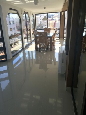 Deluxe Apartment | Living area | Flat-screen TV - Elysium Accommodation (Bucharest)