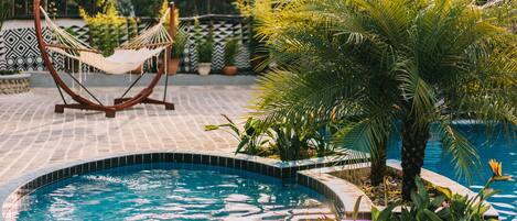 Outdoor pool, pool umbrellas, sun loungers